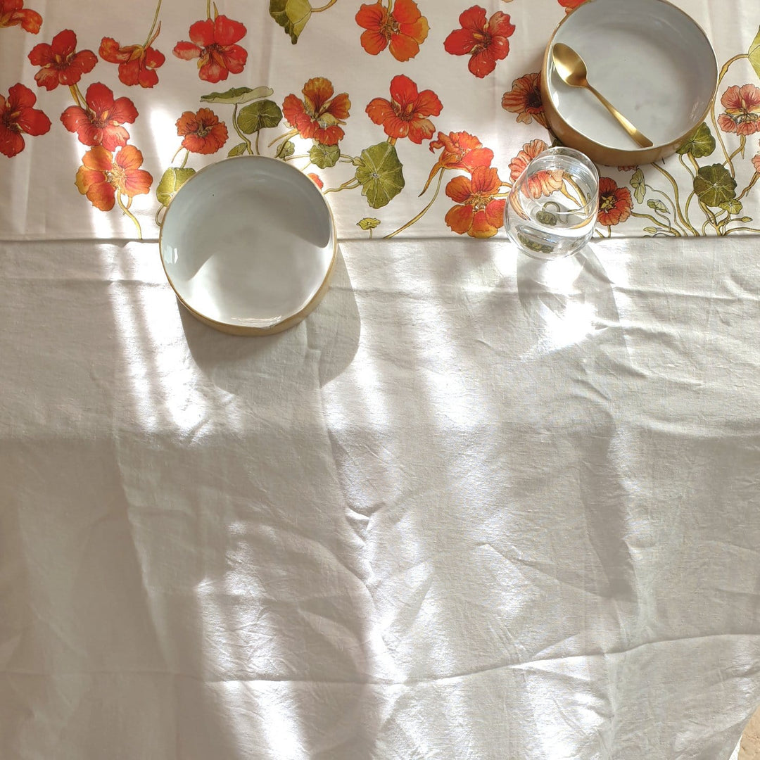 CoralBloom cotton table runner for sale patterns printed with wild nasturtiums on white
